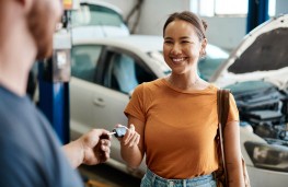 Woman in garage with keys